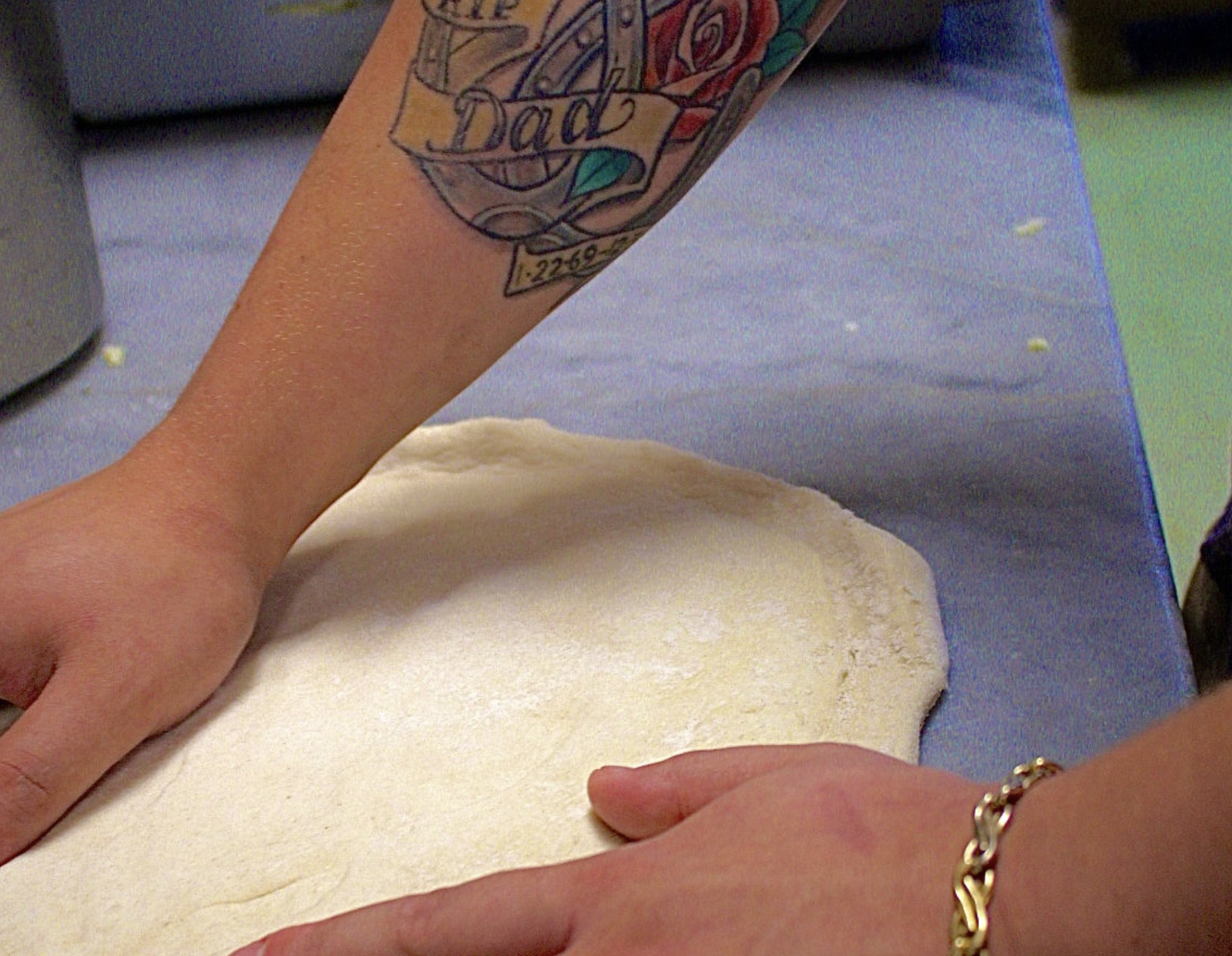 Pizza dough being prepared